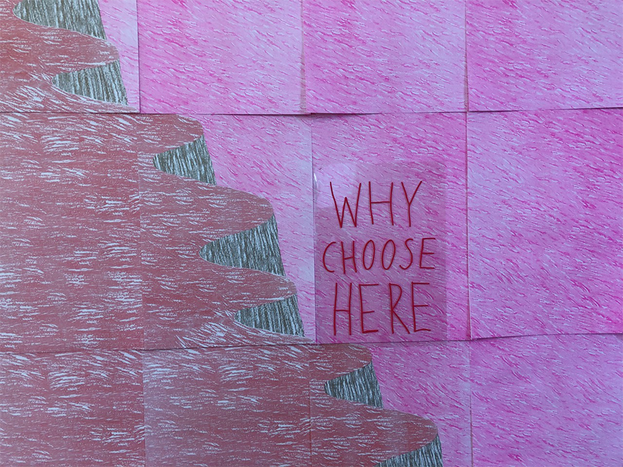 A4 pink prints creating a huge coastline, stuck on the wall with the question why choose here?