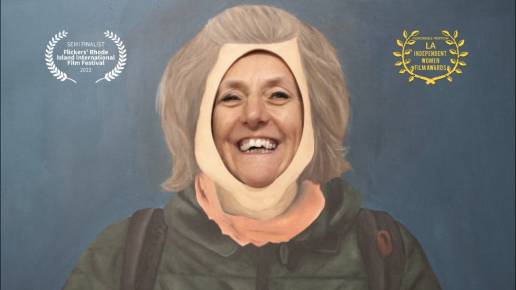 film still of Angela's face popping through a life size painting of herself